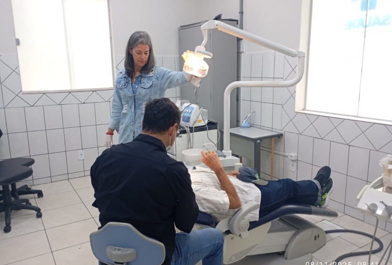 Dentista Neto e auxiliar de Saúde Bucal Cecília
